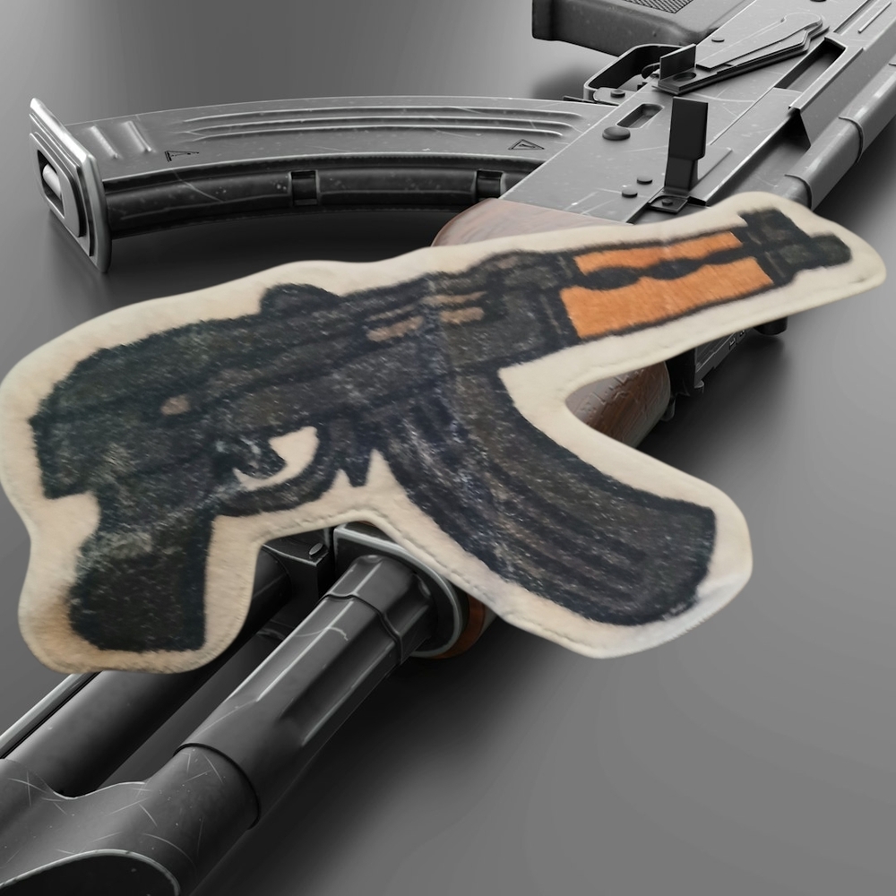 Black and Orange Gun-Shaped Rug